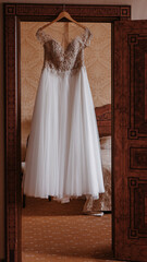 wedding dress on a hanger