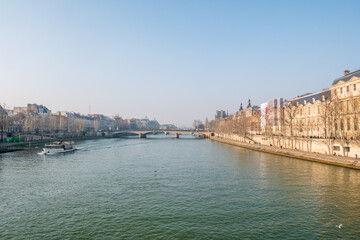 Paris, France - January 24, 2020: beautiful landscape view of Paris, picturing the Seine River and some  some buildings facades. - 750664339