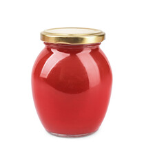 Organic ketchup in glass jar isolated on white. Tomato sauce