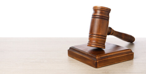 Wooden gavel on light table against white background. Space for text