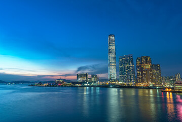 Fototapeta premium Scenery of skyscraper, skyline and harbor of Hong Kong city at dusk