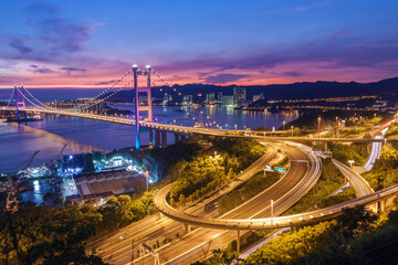 Tsing Ma Bridge in Hong Kong city at dusk - 750673530
