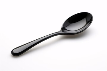 a black spoon on a white background
