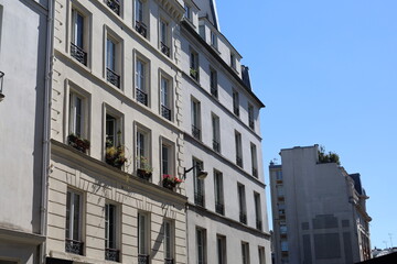 typical facade from Paris , real estate and residential building