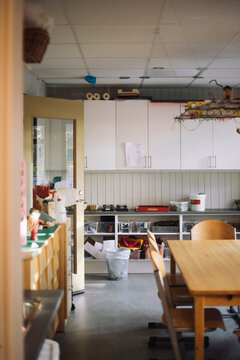 Empty activity room with chair and table at preschool