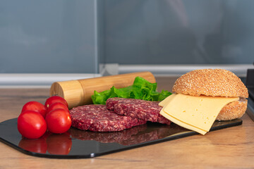 Beef cutlets for burger. Ingredients for prepare burger. Homemade burger