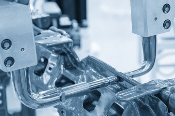 The automotive parts spot welding process by robotic system.