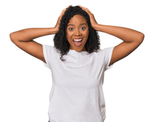 African American woman in studio setting screaming, very excited, passionate, satisfied with something.