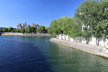 embankments of the Seine rive in Paris and city hall