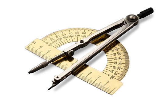 Pair of compasses and protractor isolated on white