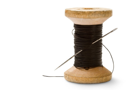 Thread bobbin isolated on white background