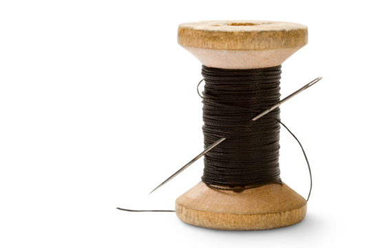Thread bobbin isolated on white background