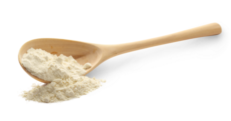 White wheat flour in wooden spoon