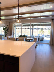 Sleek Gourmet Kitchen with Professional Grade Appliances and Wood Flooring