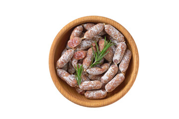 chorizo mini, spicy pork fermented dry cured salami sausages in a bowl isolated on a white background, top view.