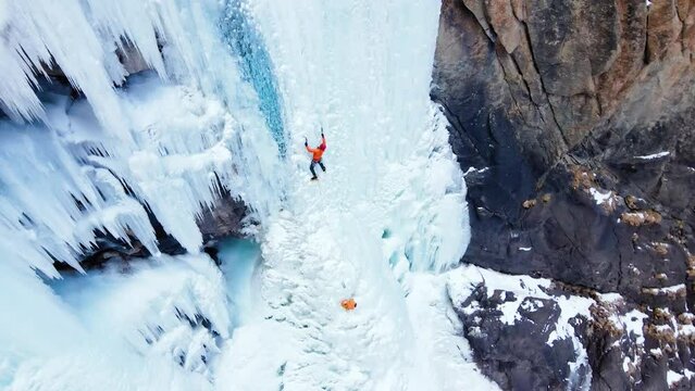 Ice climbing at frozen waterfall.