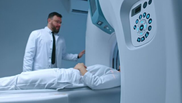 Medical laboratory equipment, X-ray machine. Magnetic resonance imaging pain-free noninvasive medical test in modern hospital. Computerized axial tomography with magnetic field and radio waves.