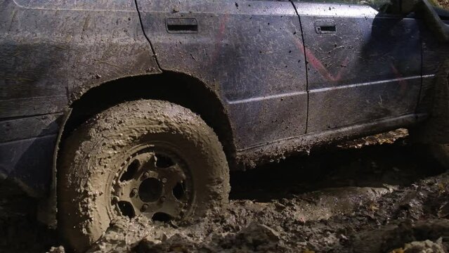 Black Truck Stuck in Mud