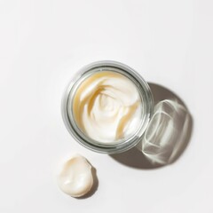 Fototapeta na wymiar Jar of face cream isolated on white background top view