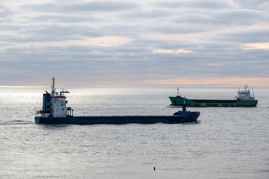the General Cargo Ships ARKLOW RAVEN and LISA meet in the evening in Westkapelle, Netherlands