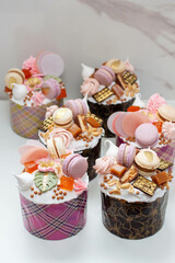 Set of beautiful traditional orthodox cakes decorated with glaze, meringues, chocolate, nuts, toffees, macaroons and jelly