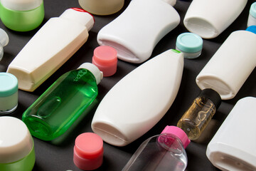 Group of plastic bodycare bottle Flat lay composition with cosmetic products on colored background empty space for you design. Set of White Cosmetic containers, top view with copy space