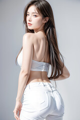 Gorgeous Young Female Model - Fashion or Cosmetics Model - White Top and Blue Jeans - Flawless Skin and Fine features - Beautiful Smooth Hair