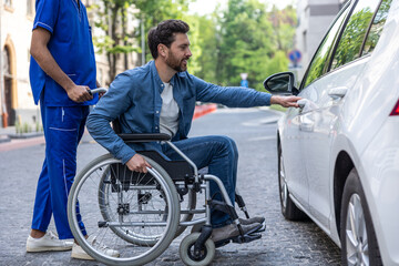Man in a wheelchair opening a car door