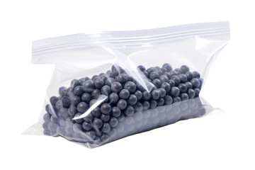 Bag of Blueberries on White Table. A bag filled with fresh blueberries is placed on top of a clean white table, creating a simple and inviting scene. Isolated on a Transparent Background PNG.