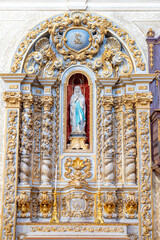 religious figure inside the Royal and parish church of São Pedro.
