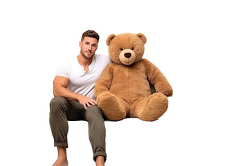 Man Sitting Next to Giant Teddy Bear. A man is seated beside a massive teddy bear, showcasing the stark size difference between the two figures. Isolated on a Transparent Background PNG.