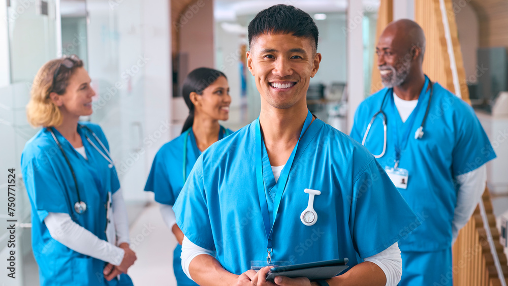 Sticker Portrait Of Smiling Multi Cultural Medical Team Wearing Scrubs In Modern Hospital 