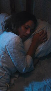 Vertical video. Insomnia, sleep disturbances concept. 