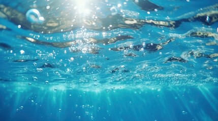  underwater ,Lots of air bubbles float in the blue water  - obrazy, fototapety, plakaty