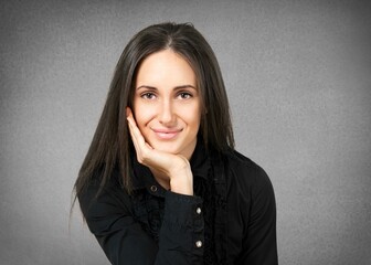 Obraz premium Smiling young businesswoman wearing shirt.