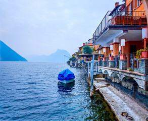 Fototapeta na wymiar The lakeside building with magnificent views overlooking Lake Lugano in Gandria, Switzerland