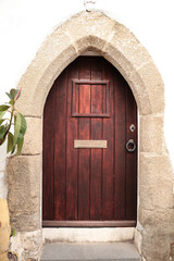 Wooden door and stone threshold in Elvas town
