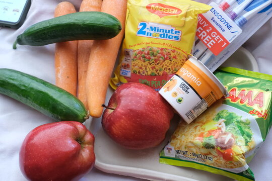 Masala Maggi Noodles, along with other groceries stuffs : new delhi India 2024