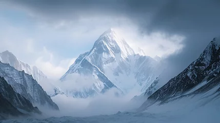 Wall murals K2 a snowy mountain range with clouds with K2 in the background