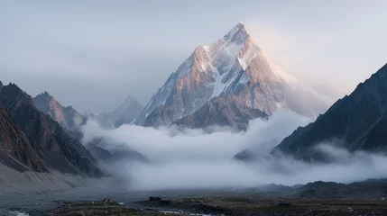 Papier Peint photo Ama Dablam a mountain with snow on top and clouds in the sky