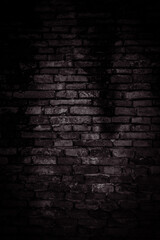 Vertical Black brick walls that are not plastered background and texture. The texture of the brick is black. Background of empty brick basement wall.