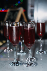 Red Cocktails in Elegant Stemware at Nightclub