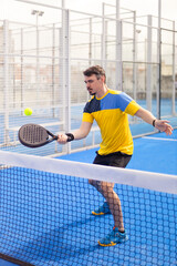 Open Tour template. Padel tennis player on the blue court background outdoors. Paddle tenis template for bookmaker design ads with copy space. Mockup for betting advertisement. Sports betting on tenis - 750814993