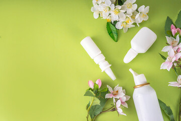 Seasonal spring allergies concept. Fresh spring blooming tree branches, various nasal allergy...