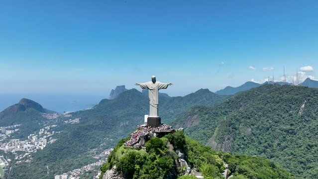 Christ The Redeemer At Corcovado Mountains Rio De Janeiro Brazil. Redeemer Sculpture. Business Clouds Sky Downtown Cityscape. Business Outdoor Downtown Backgrounds Famous.