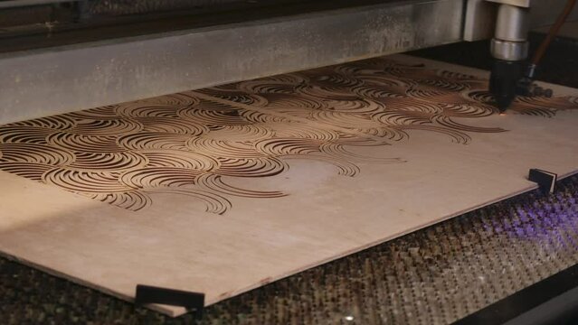 Timelapse laser woodworking. Example of laser application in industry