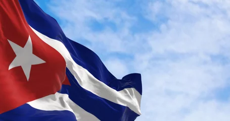 Fototapeten Cuba national flag waving in the wind on a clear day © rarrarorro