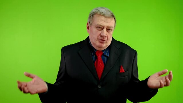 Businessman in suit sincerely apologies and regret