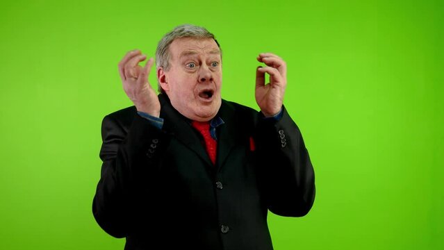 Businessman sees terrible, covers face and scream.