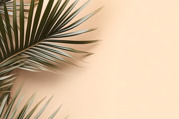 Minimalistic summer concept featuring tropical palm leaves casting shadows on a pastel beige background, evoking serene tropical vibes.